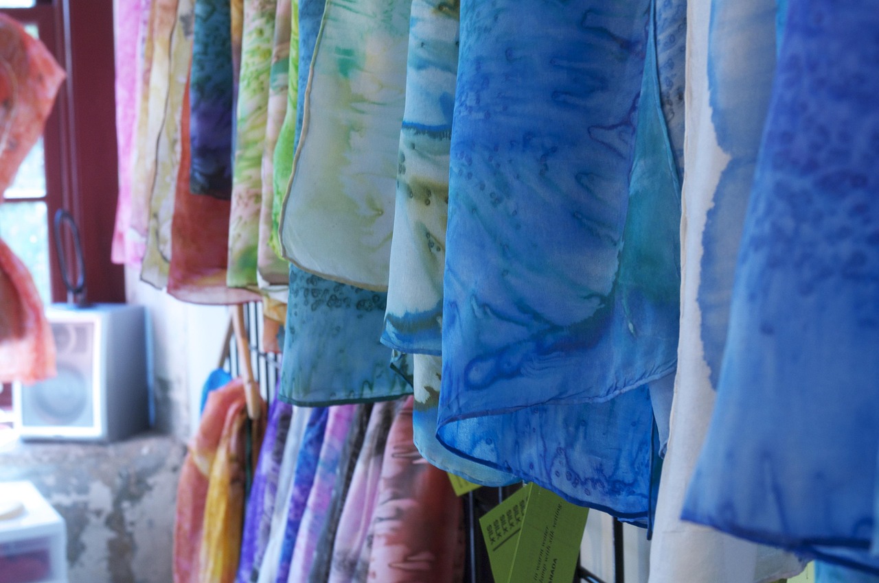 Colorful bulk disposable vape devices standing in retail display rows